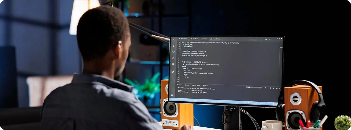 Developer coding on computer
